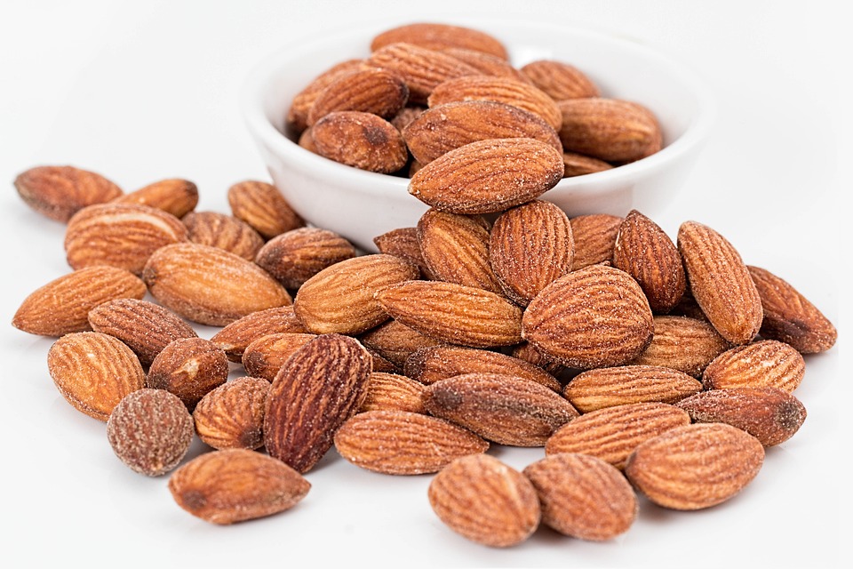almonds in bowl white background