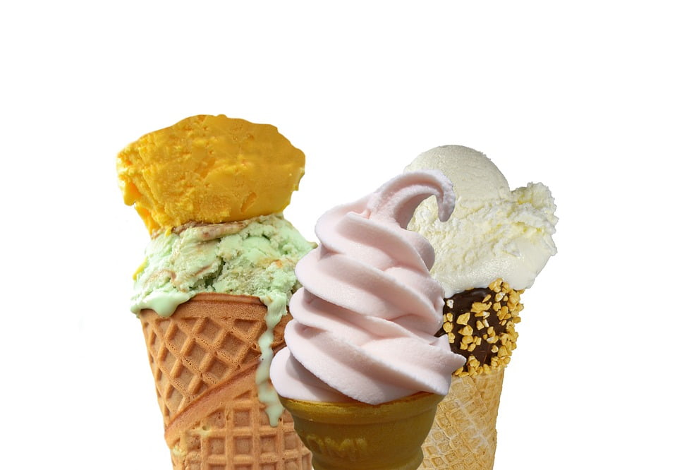 Image of three ice cream cones with each holding either ice cream, frozen yogurt, or gelato