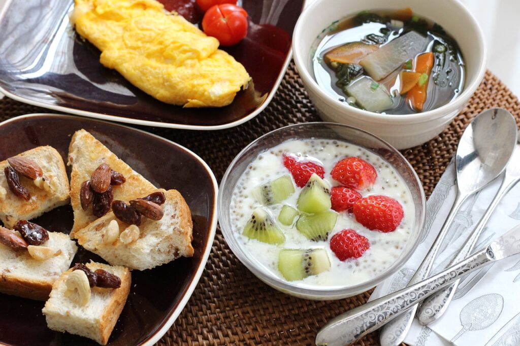 breakfast_different_food_options_eggs_fruit_soup_toast