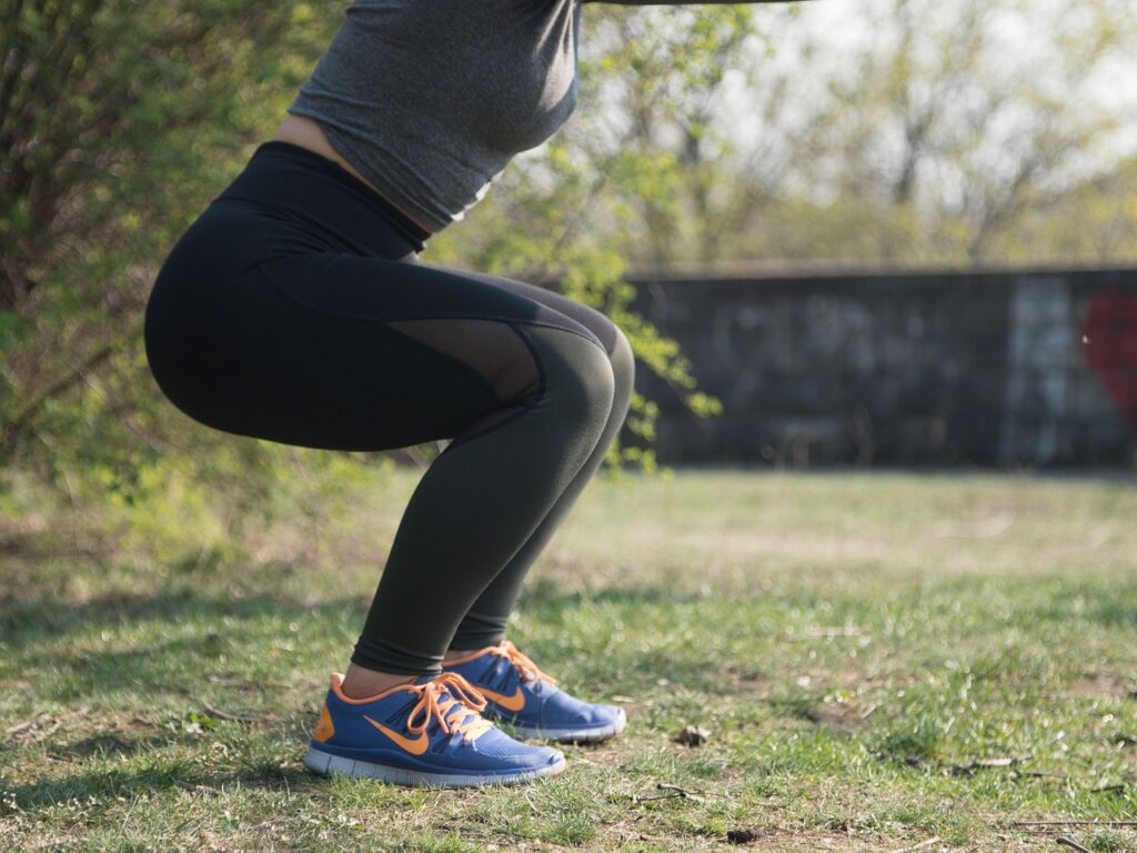 woman_squatting_outside_working_out_starting_weigh_loss_journey