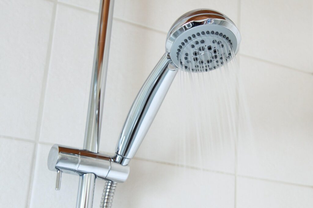 image of running shower head 